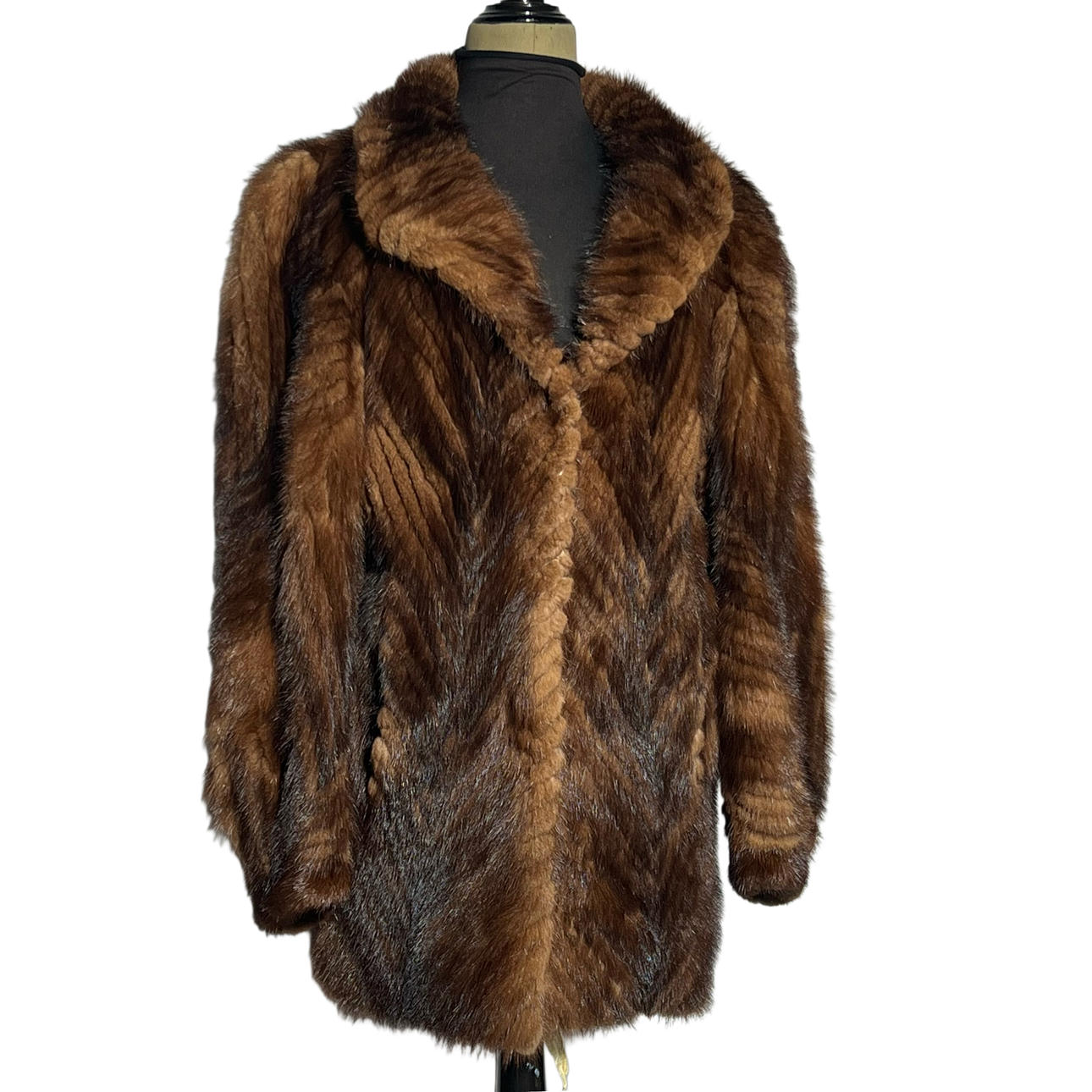 Minkfrakke med stropper.