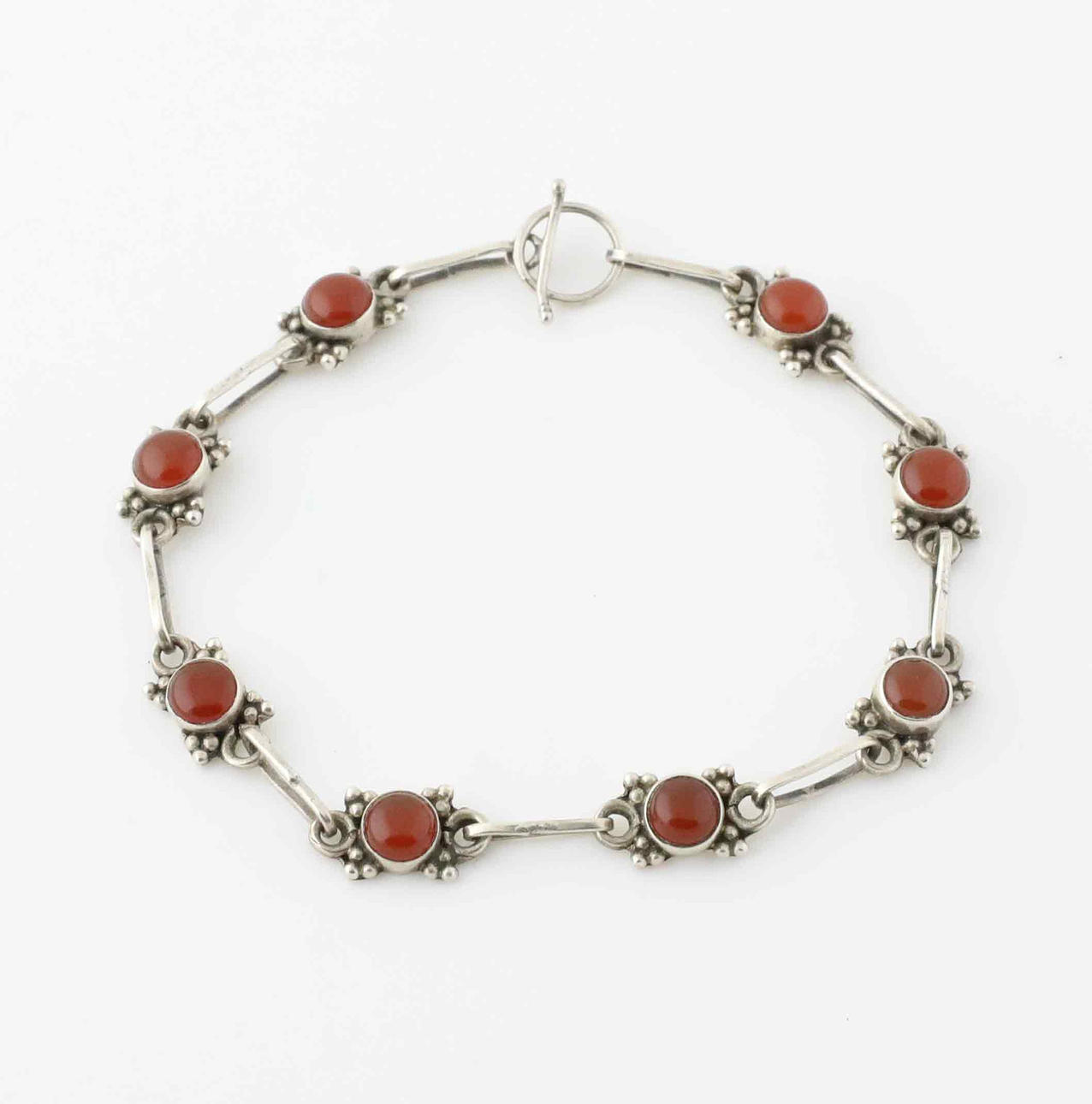 BRACELET, red jasper and silver.