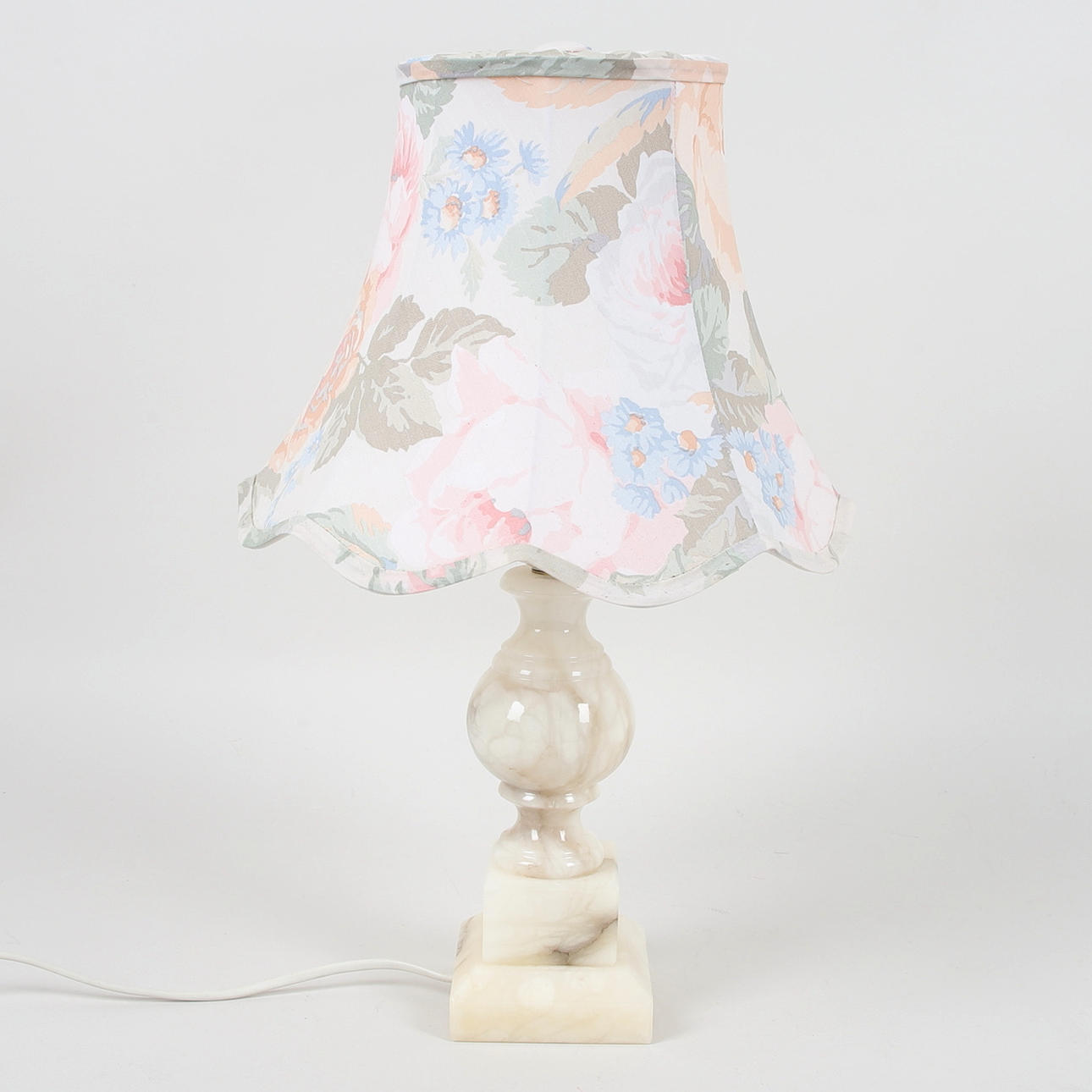 A stone/marble table lamp, marked RAF, 20th century.