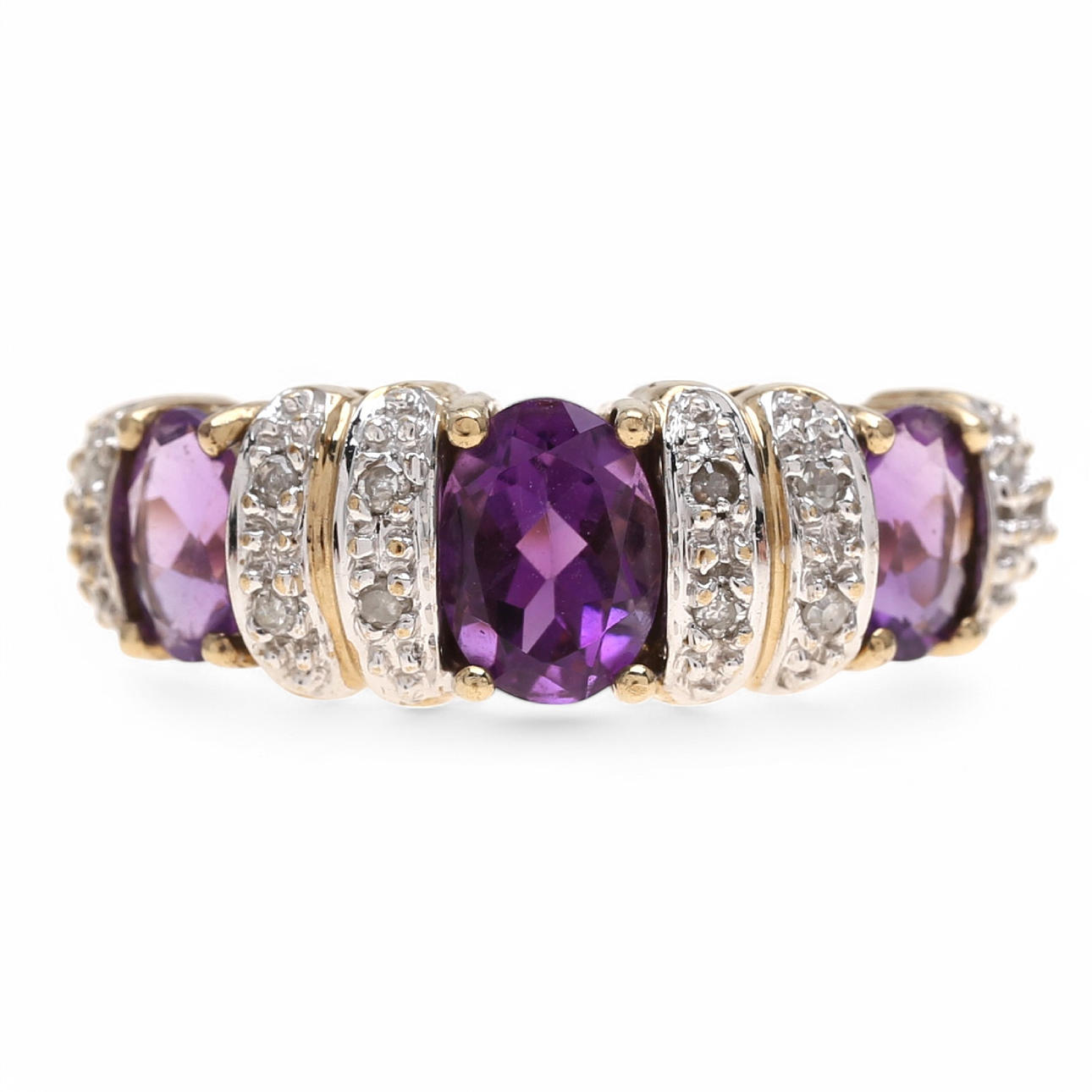 Diamonds and amethysts half wedding ring.