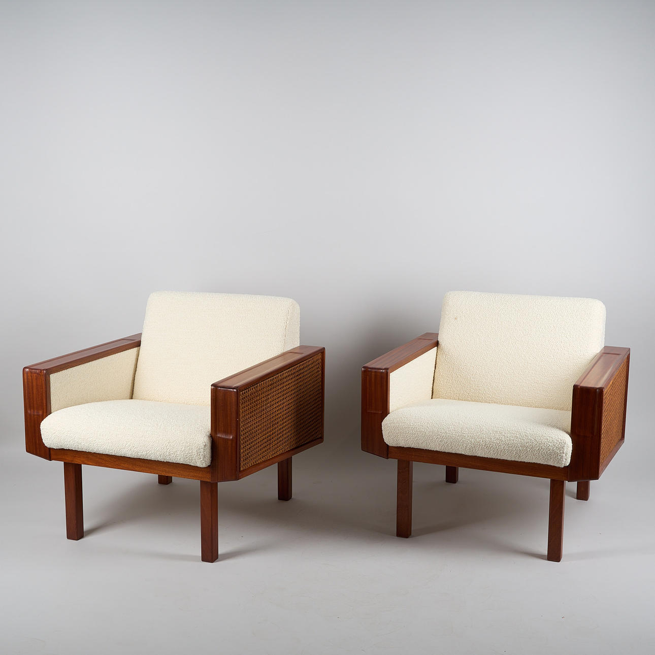 A pair of 1950s armchairs.