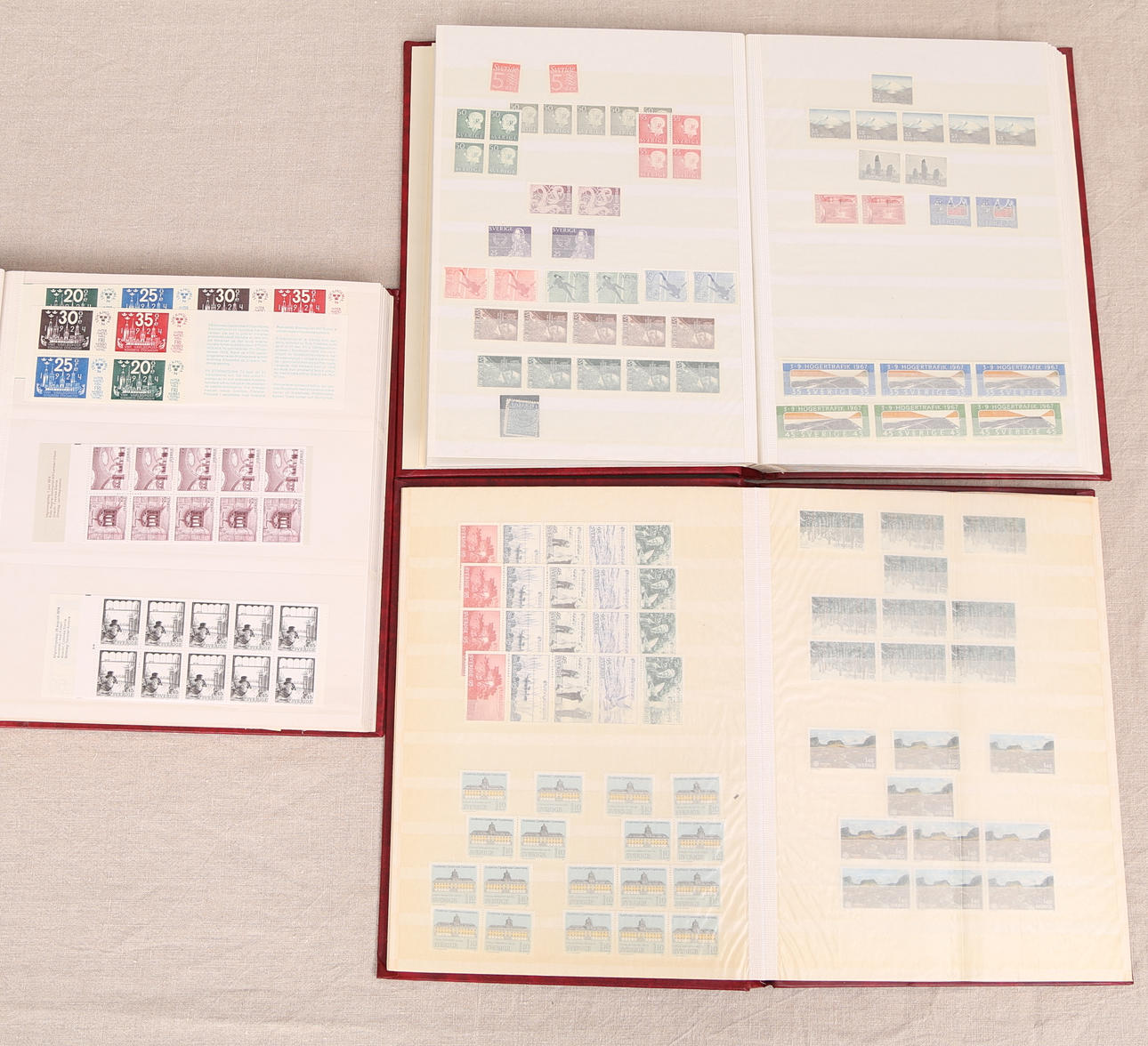 FRIMÄRKSALBUM, 3 st röda, svenska, ostämplade, 1900-tal, ca 2300 kr.