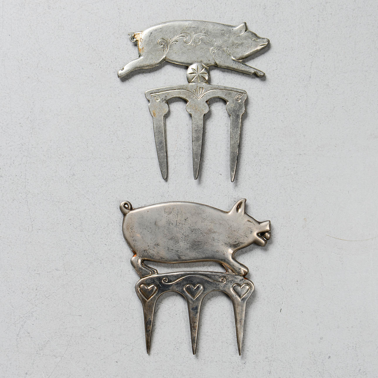 HAM FORKS, 2 pcs, pigs, one designed by Gun Ulriksson.