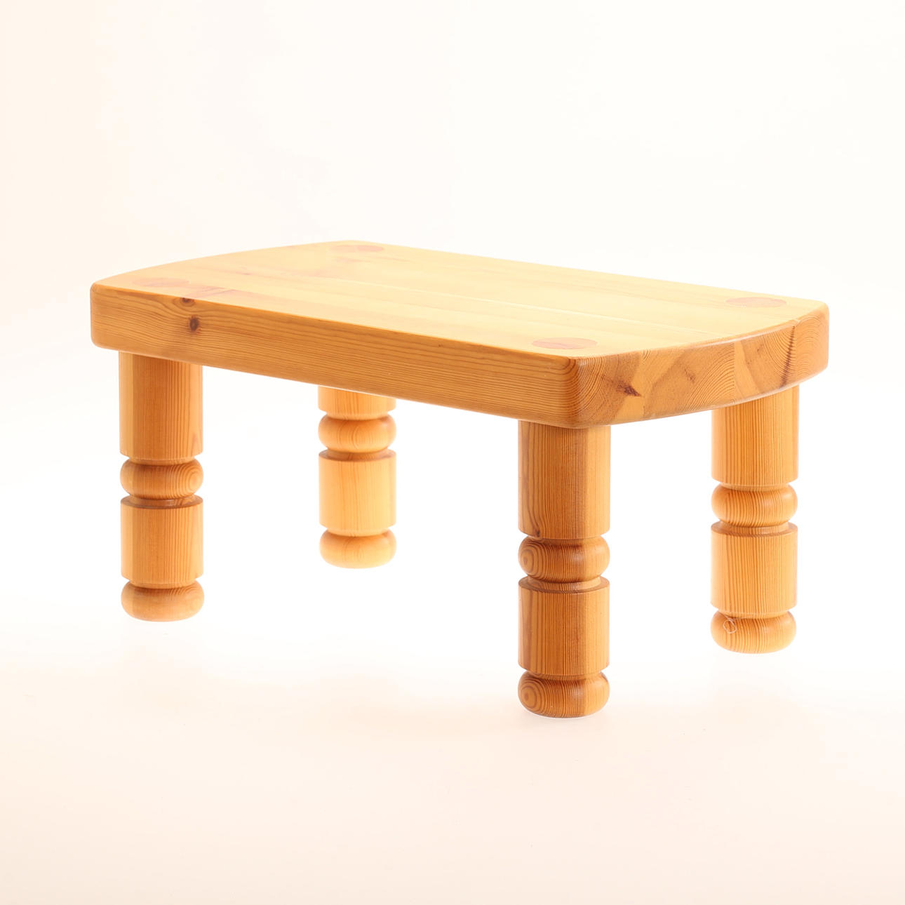 A pine stool, marked Sven Öhlin.