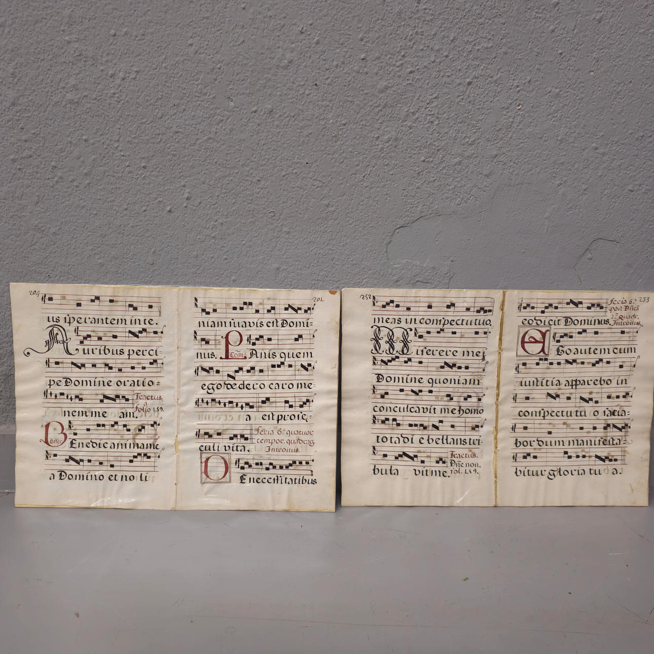 FOUR OLD SHEETS ON PARCHMENT-TYPE PAPER.
