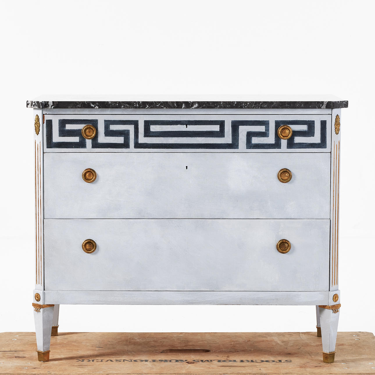 Chest of drawers, three drawers in sarg of which upper drawer with painted meander border, brass fittings, marble top, Gustavian style, 20th century.