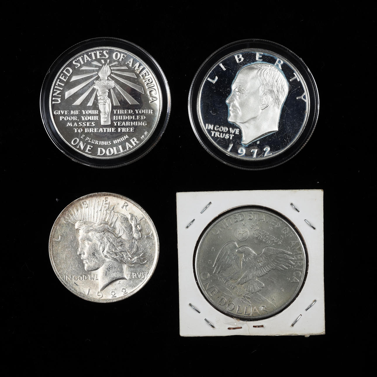 4 US dollar coins, 1922-1986.