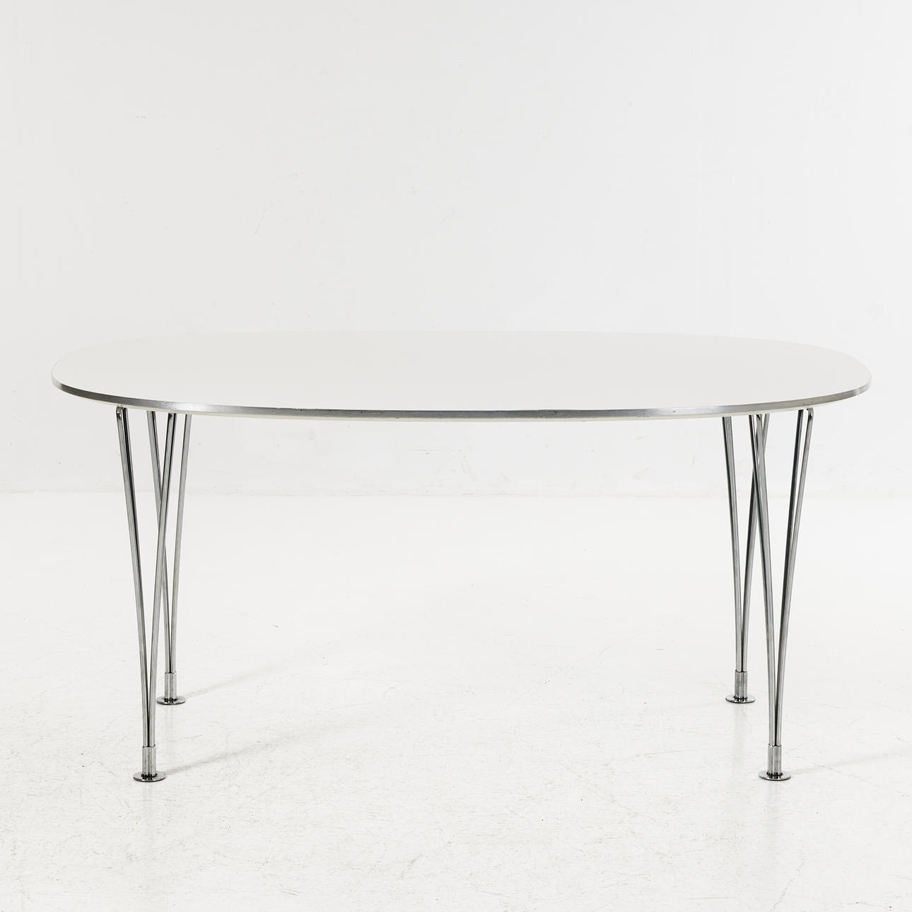 BRUNO MATHSSON & PIET HEIN. Dining table, “Superelips”.