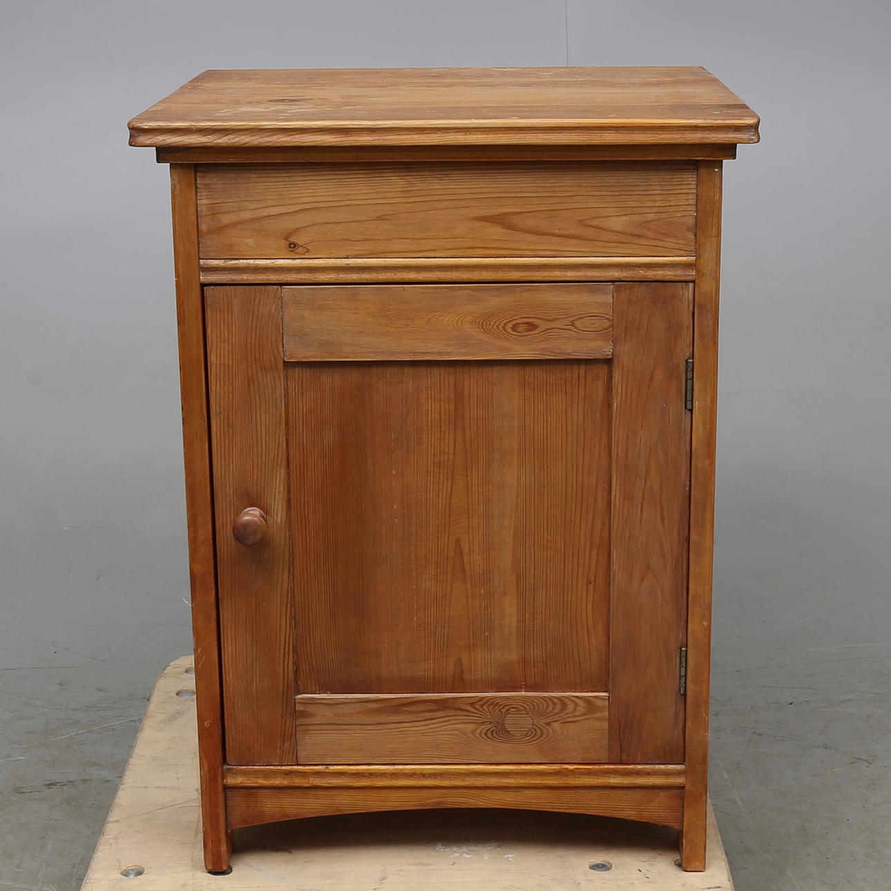 KOMOD, omkring 1900.