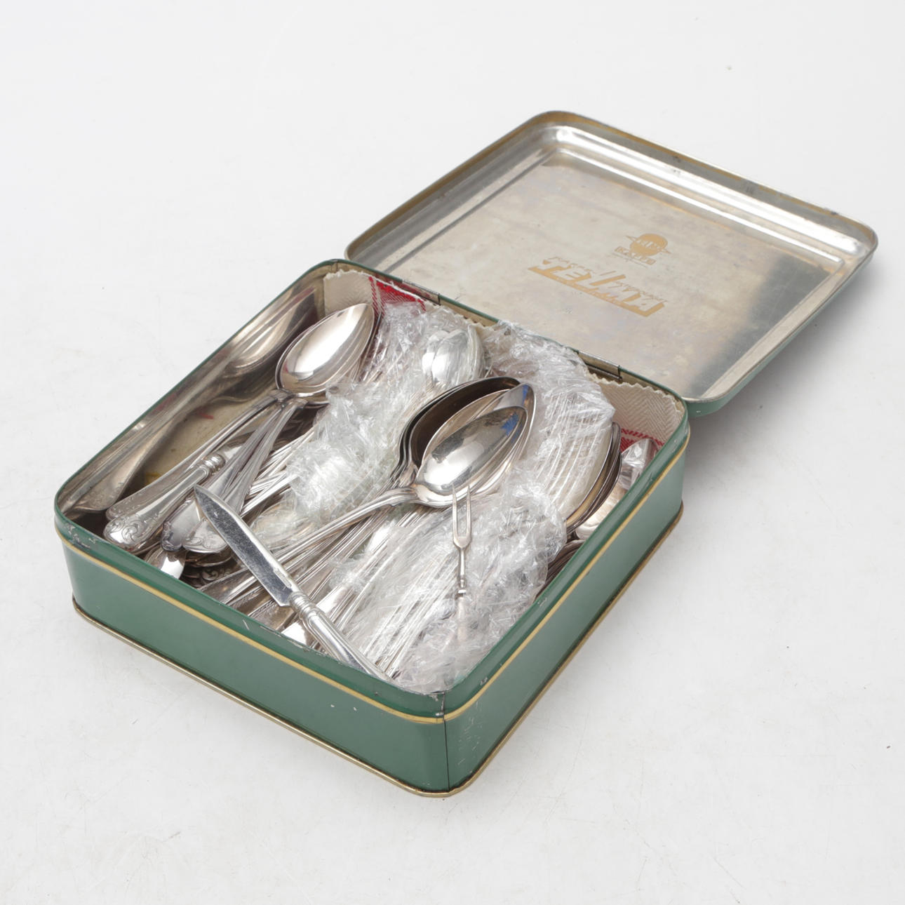 Cutlery, nickel silver, in tin box.