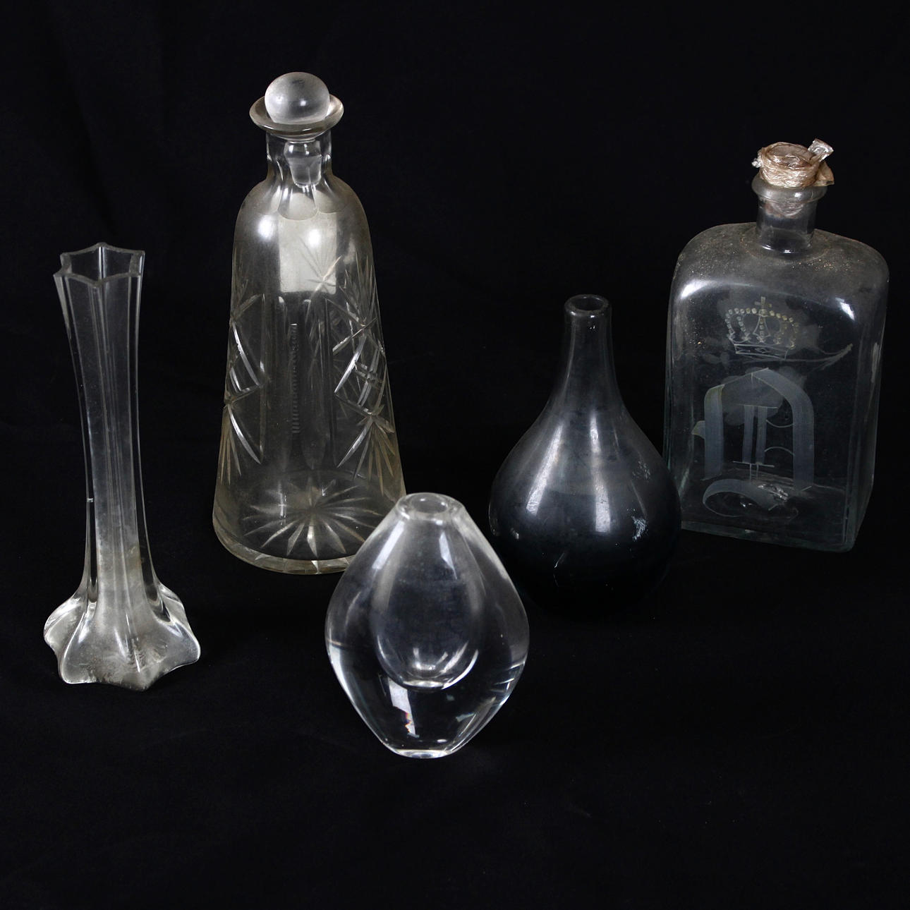 A set of five glass decanters and vases, first half of the 20th century.