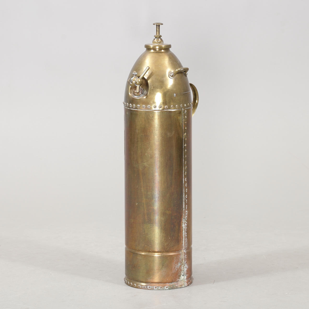 A solid fire extinguisher, early 20th century.