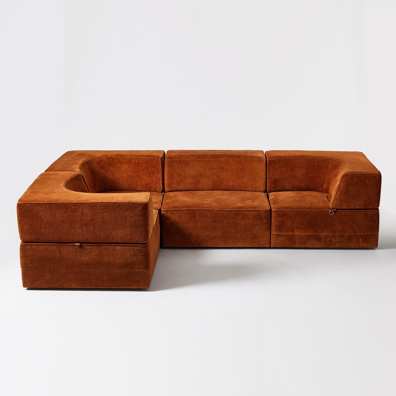MODULAR SOFA, 1970s, solid frames upholstered in brown fabric.