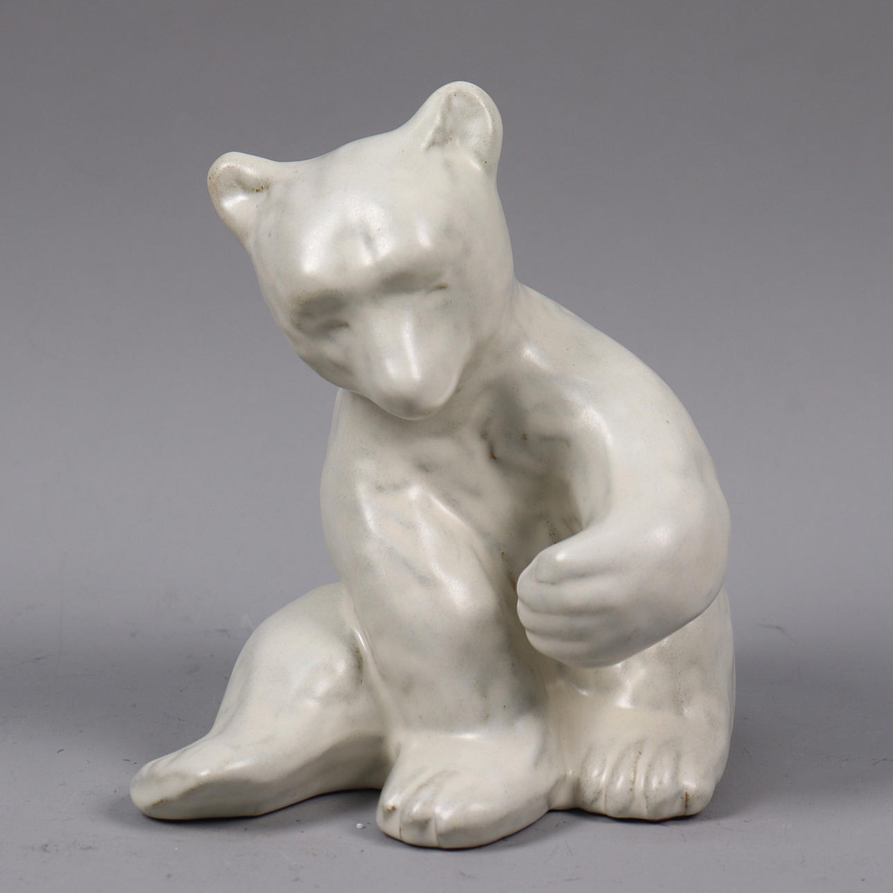 VICKE LINDSTRAND. Upsala Ekeby, figurine, sitting bear.