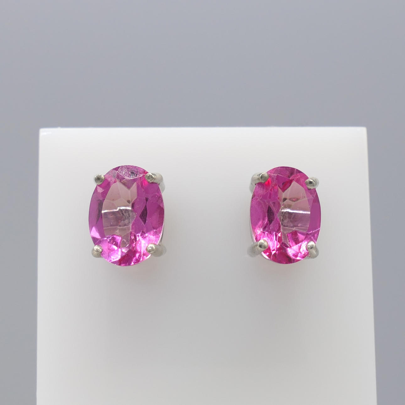 VIVID PINK TOPAZ studs.
