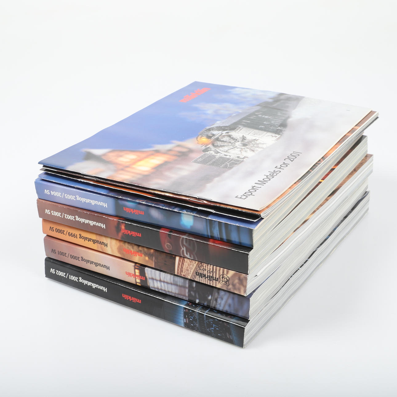 MÄRKLIN. Kataloge, 8 Stück, 2000-2004.