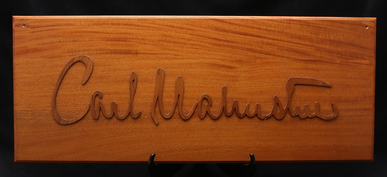 SKYLT, mahogny, "Carl Malmsten".