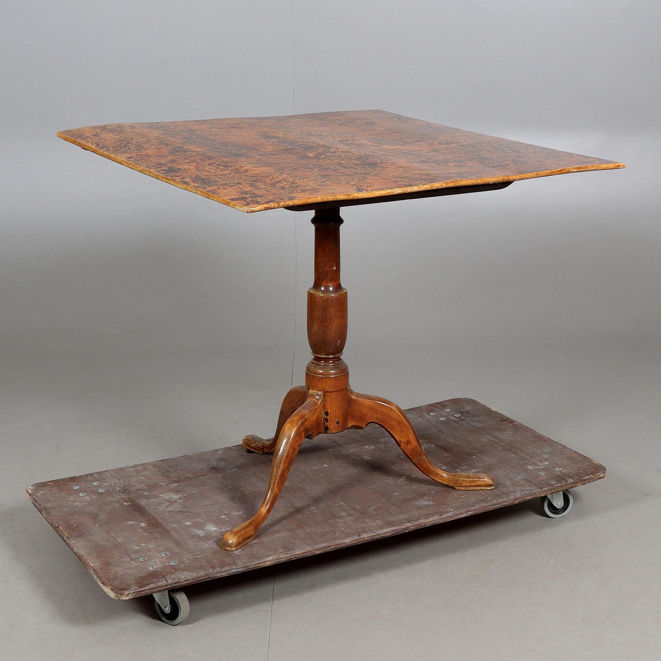 A folding table, veneered alrot, 19th century.