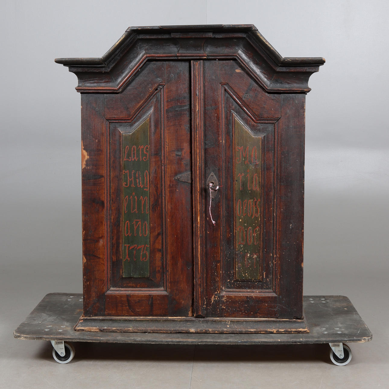 A hanging cabinet, allmoge, dated 1775.