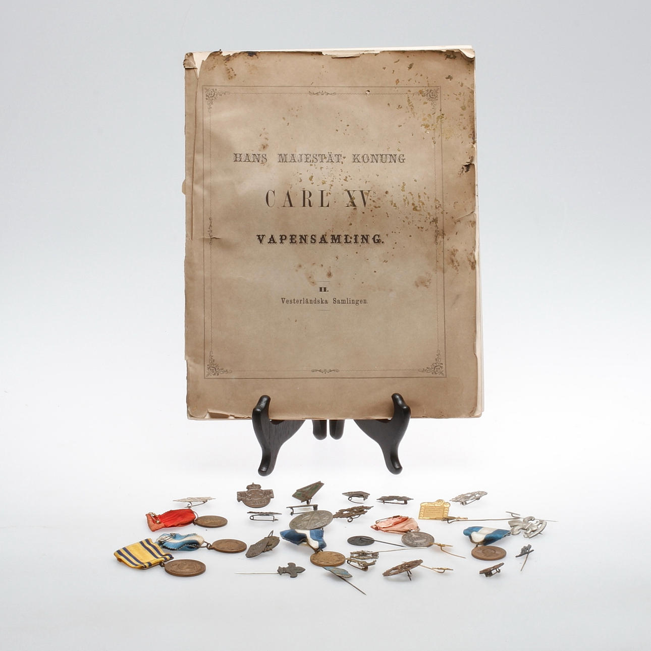 VAPENBOK OCH MEDALJER.