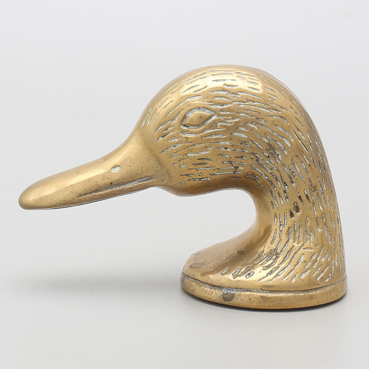 FLASKÖPPNARE, mässing, i form av and, 1900-tal.