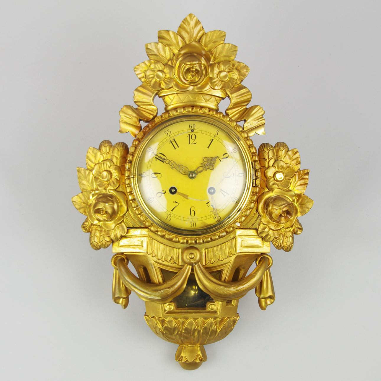 PENDULUM WALL CLOCK, gilded.