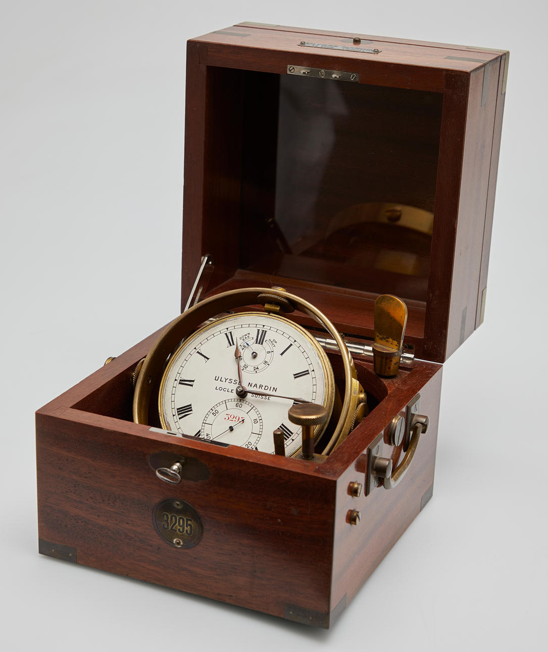 ULYSSE NARDIN. Marine chronometer/watch, caliber 3295, brass, wood