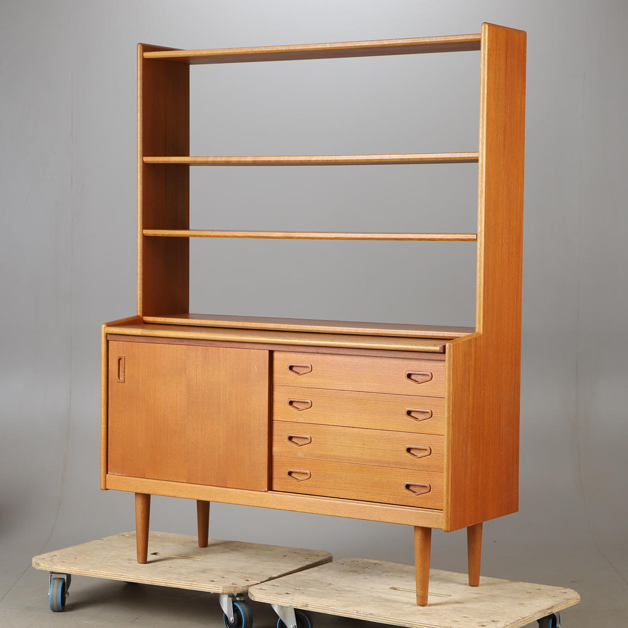 A teak and oak bookcase, mid 20th century.