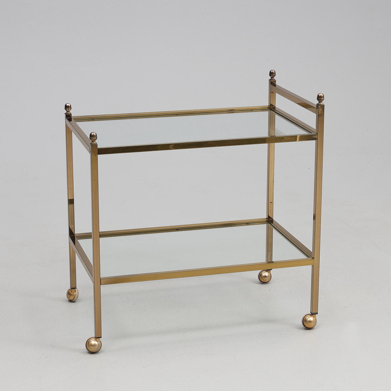 SERVING TROLLEY. Glass/brass, 20th century.