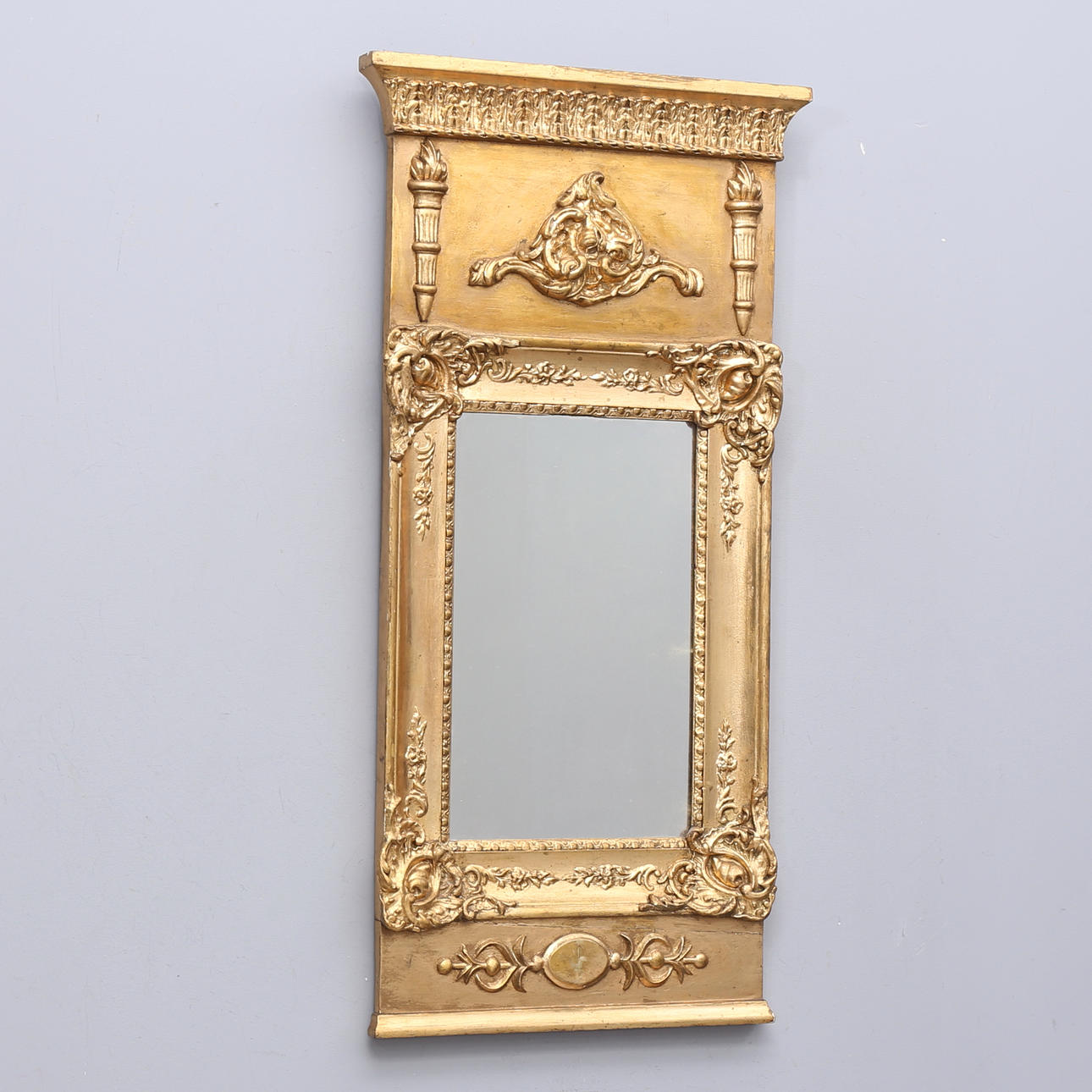 An empire gilt mirror, 1830s.