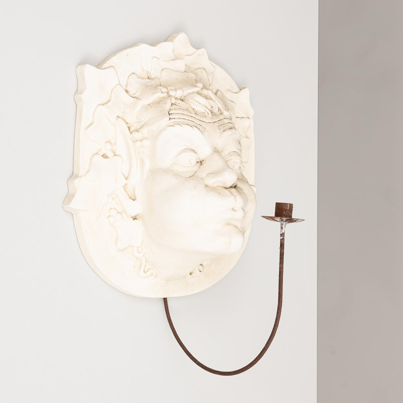 WALL SCULPTURE, Dionysus with candlestick, plaster.
