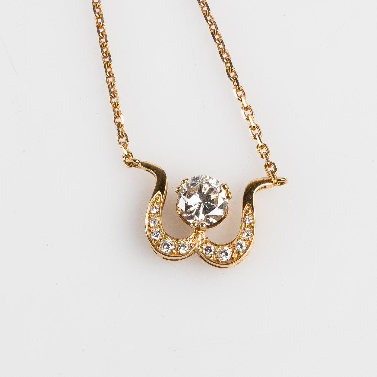 COLLIER 18K guld.