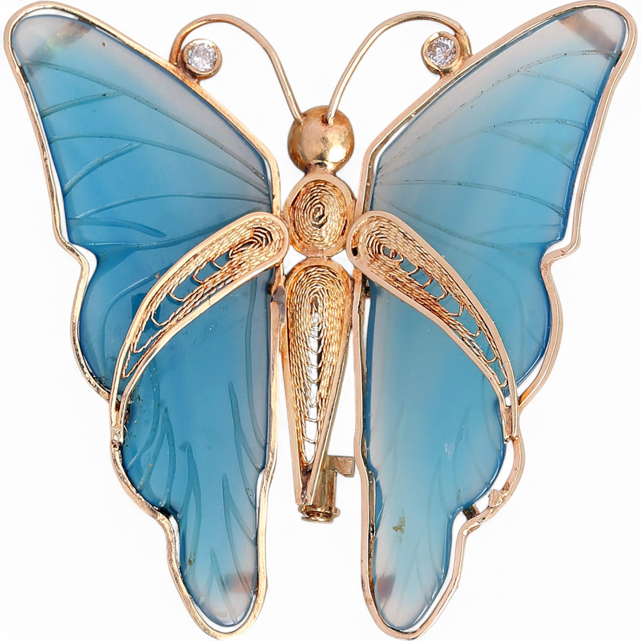Sommerfuglformet guldbroche.