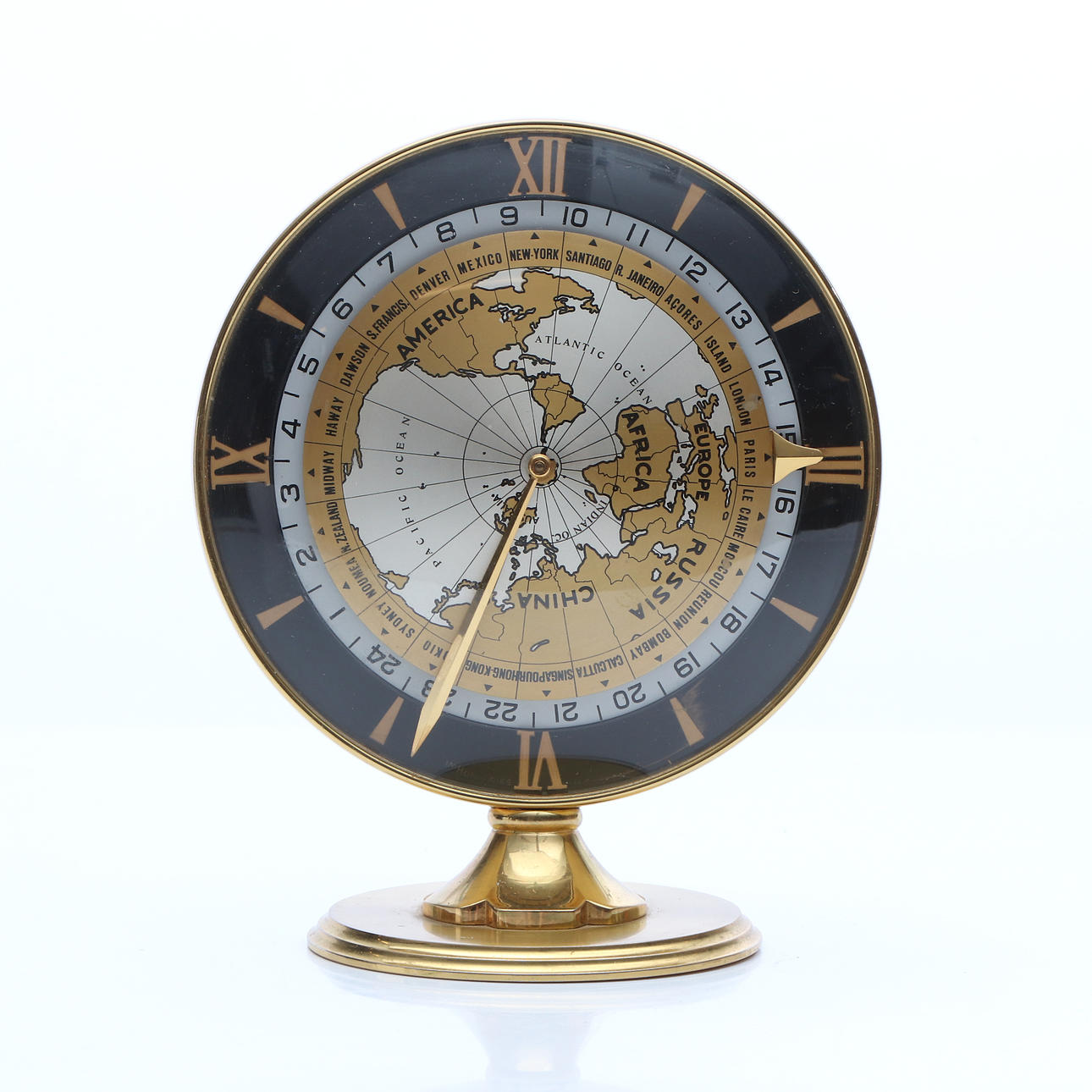 IMHOF, TABLE CLOCK. Brass. Worldtime. Mechanical work, mid 20th century.