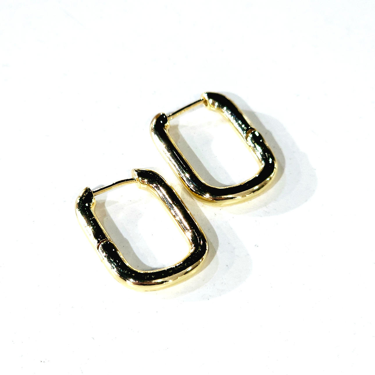 “rectangular” silver hoop earrings with yellow gold plaque. Brand new.