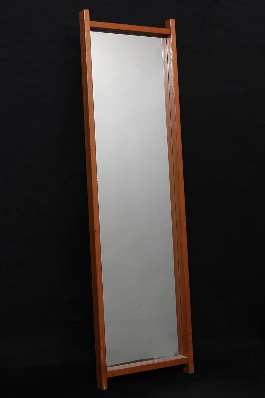 A 1950s/60s teak mirror.
