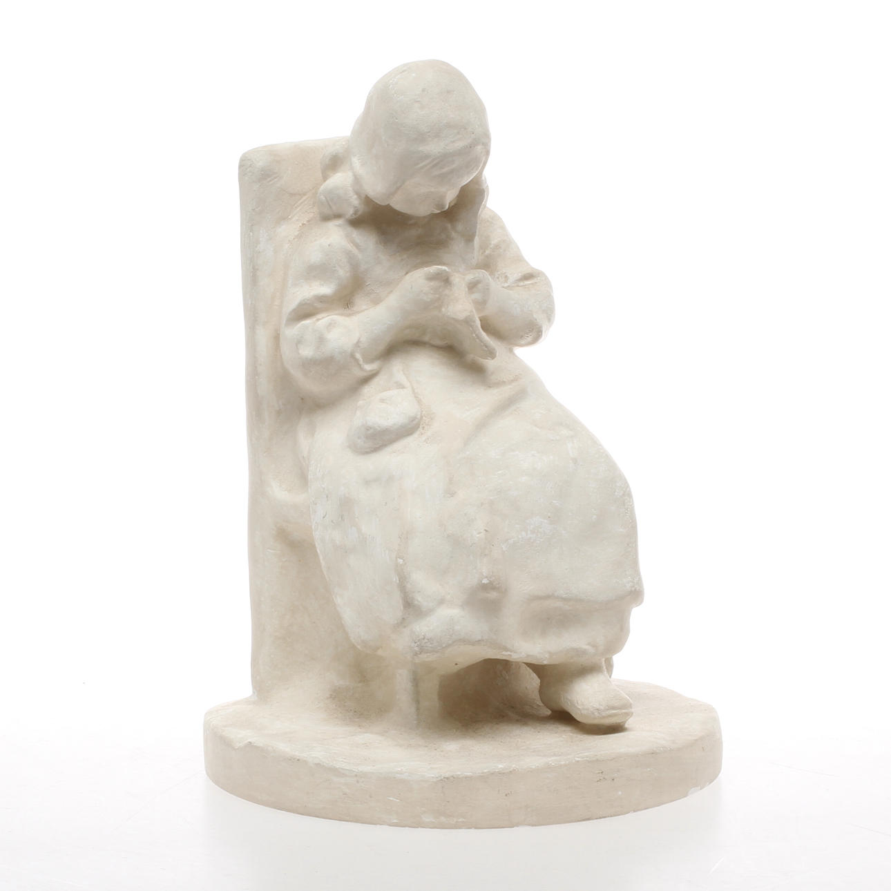 RUTH MILLES. Handicraft girl, plaster, signed and dated 1911.