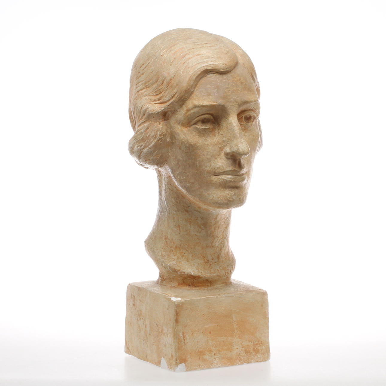 CARIN NILSSON. Portträttbyst föreställande kvinna, patinerad gips, signerad och daterad 1934.