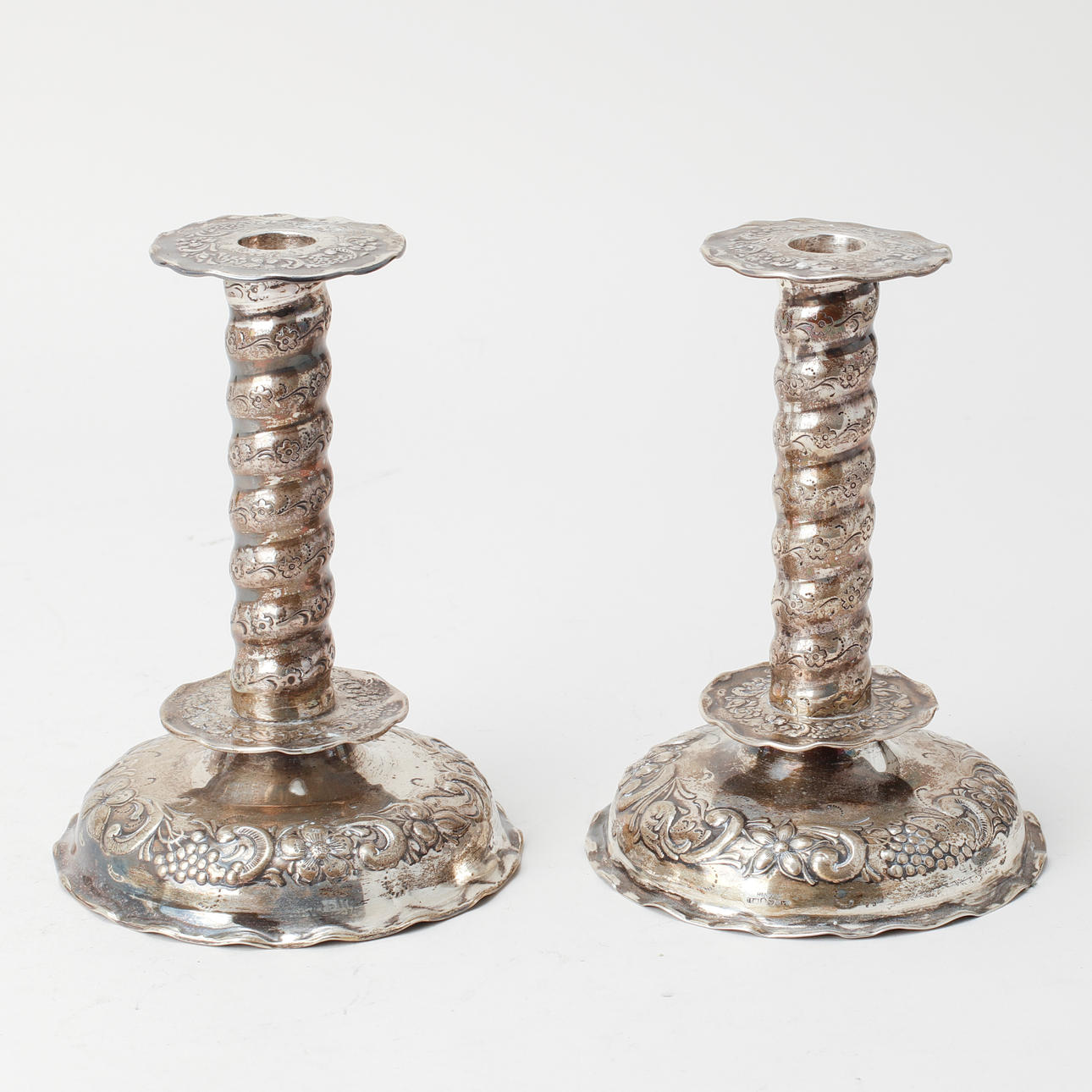 A pair of silver Tesi candlesticks.
