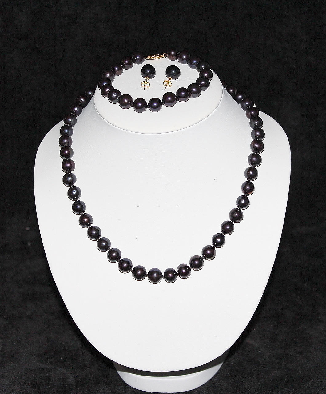 SMYCKESET, blåsvarta odlade saltvattenpärlor, halsband, armband, örhängen , 14 k guldlås.