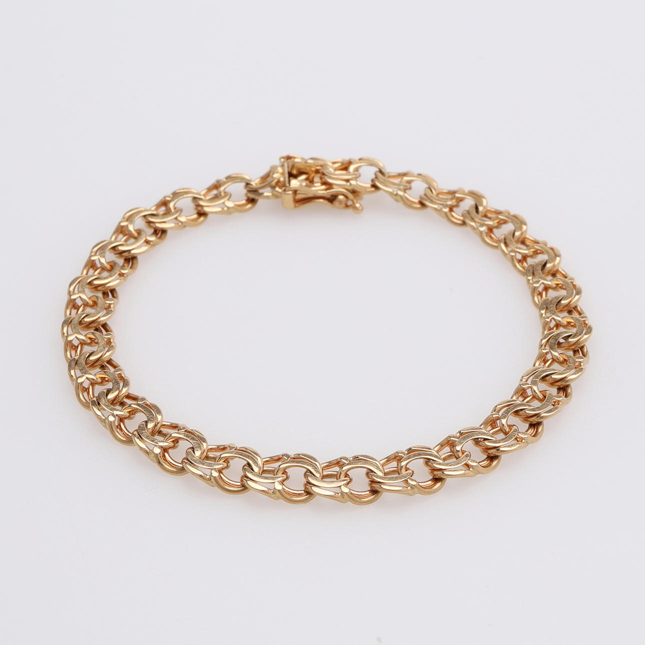 GOLDARMBAND 18 KARAT, BISMARCKLINK, CA. 20 CM.