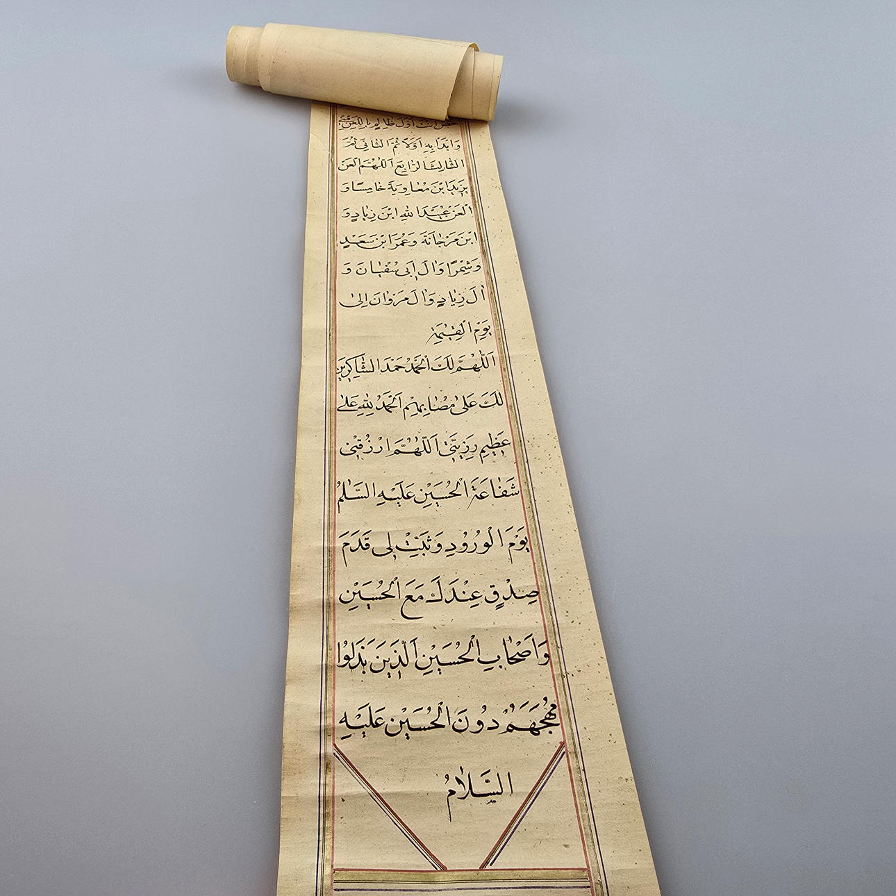 PRAYER TEXT ON A NARROW ROLL OF PAPER.