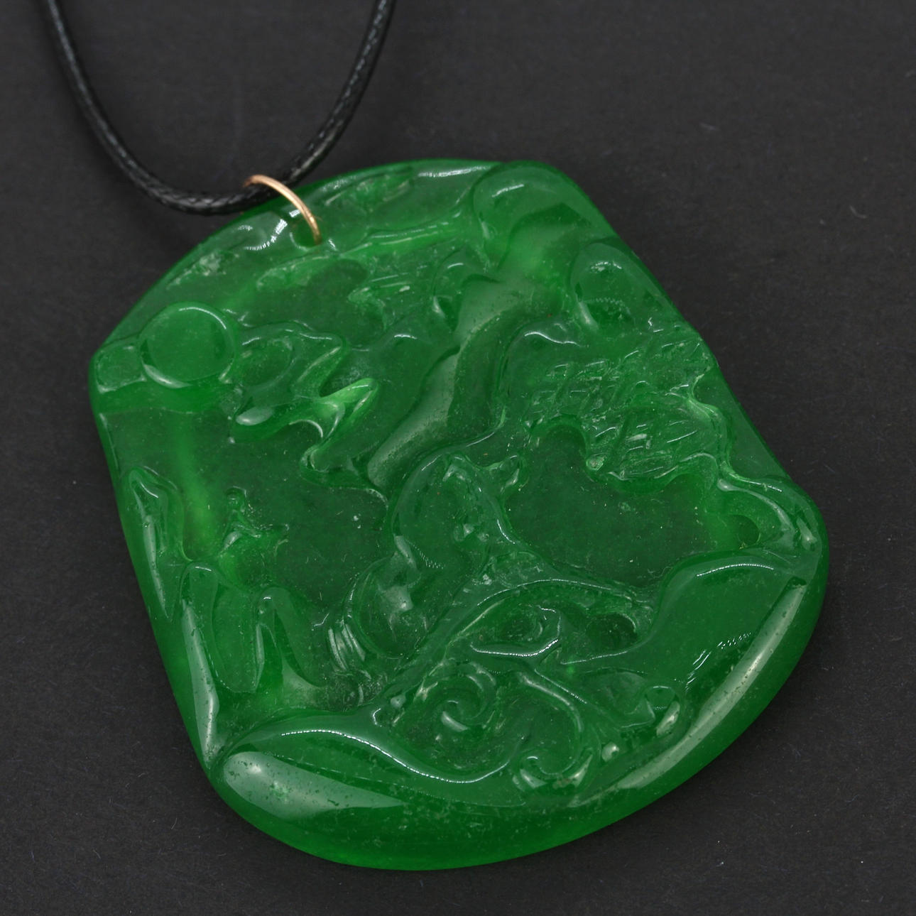 KINESISK JADE AMULETT.