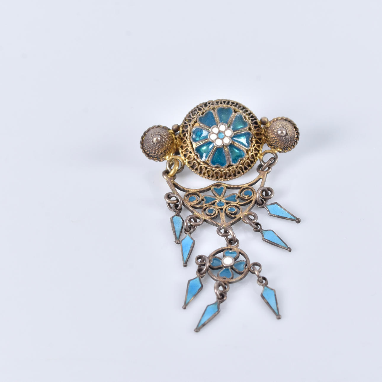 EMAILLE-BROSCHE, antiker Modeschmuck, vergoldetes Metall.