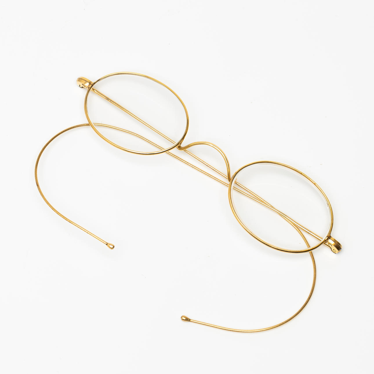 GLASÖGON, båge av låghaltigt guld, omkring 1900.