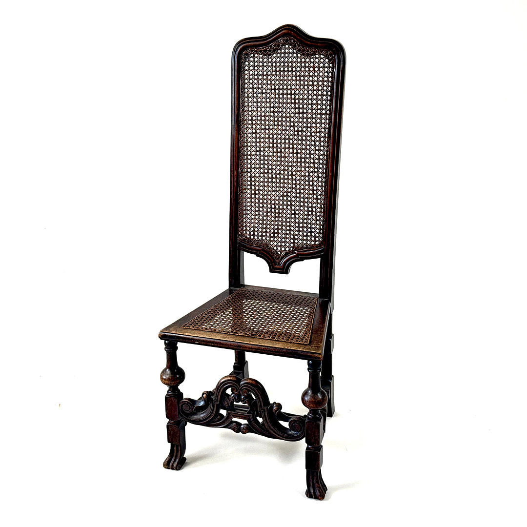 1920'S JACOBEAN STYLE CANE CHAIR.