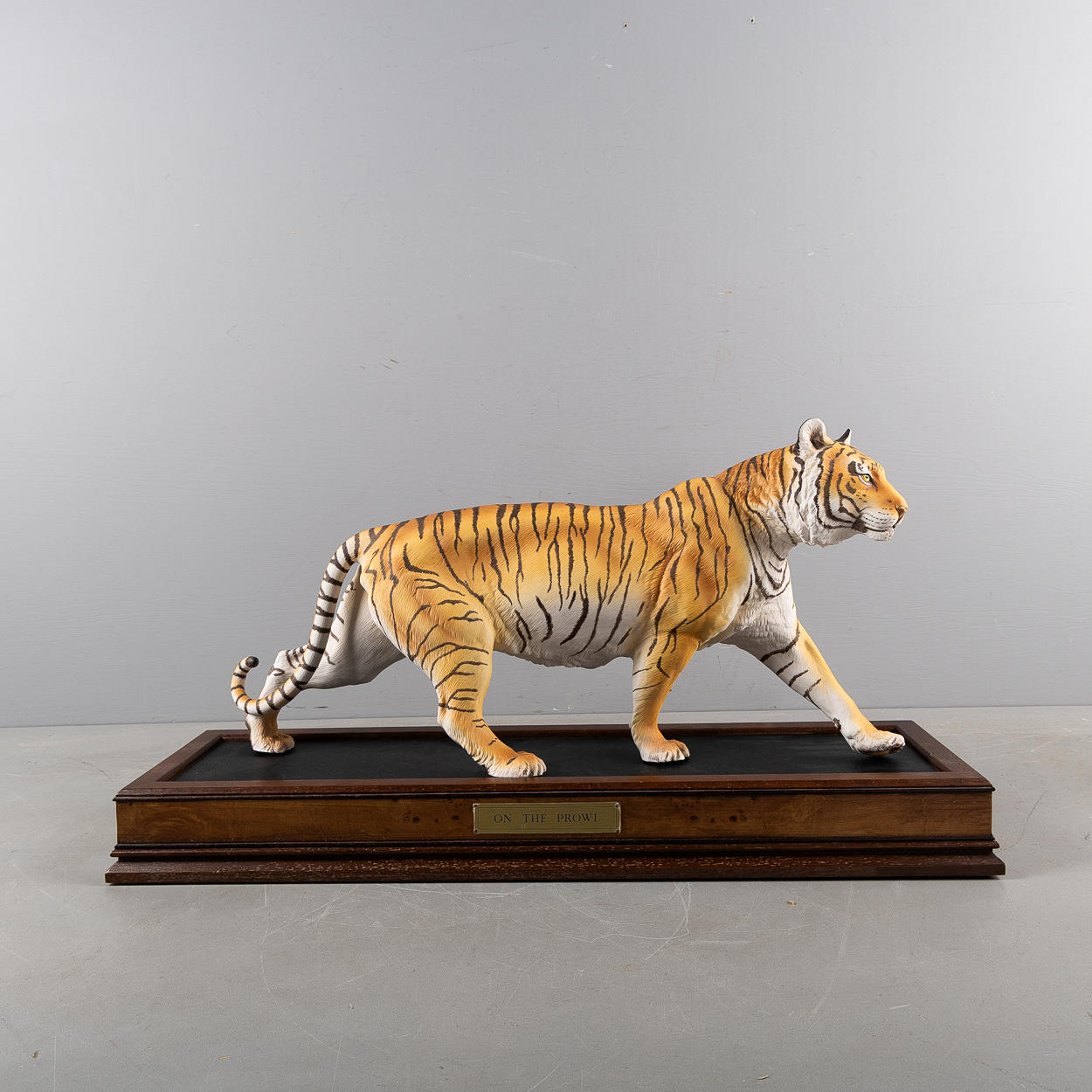A porcelain figurine of a tiger, “On the prowl”, Franklin Mint 