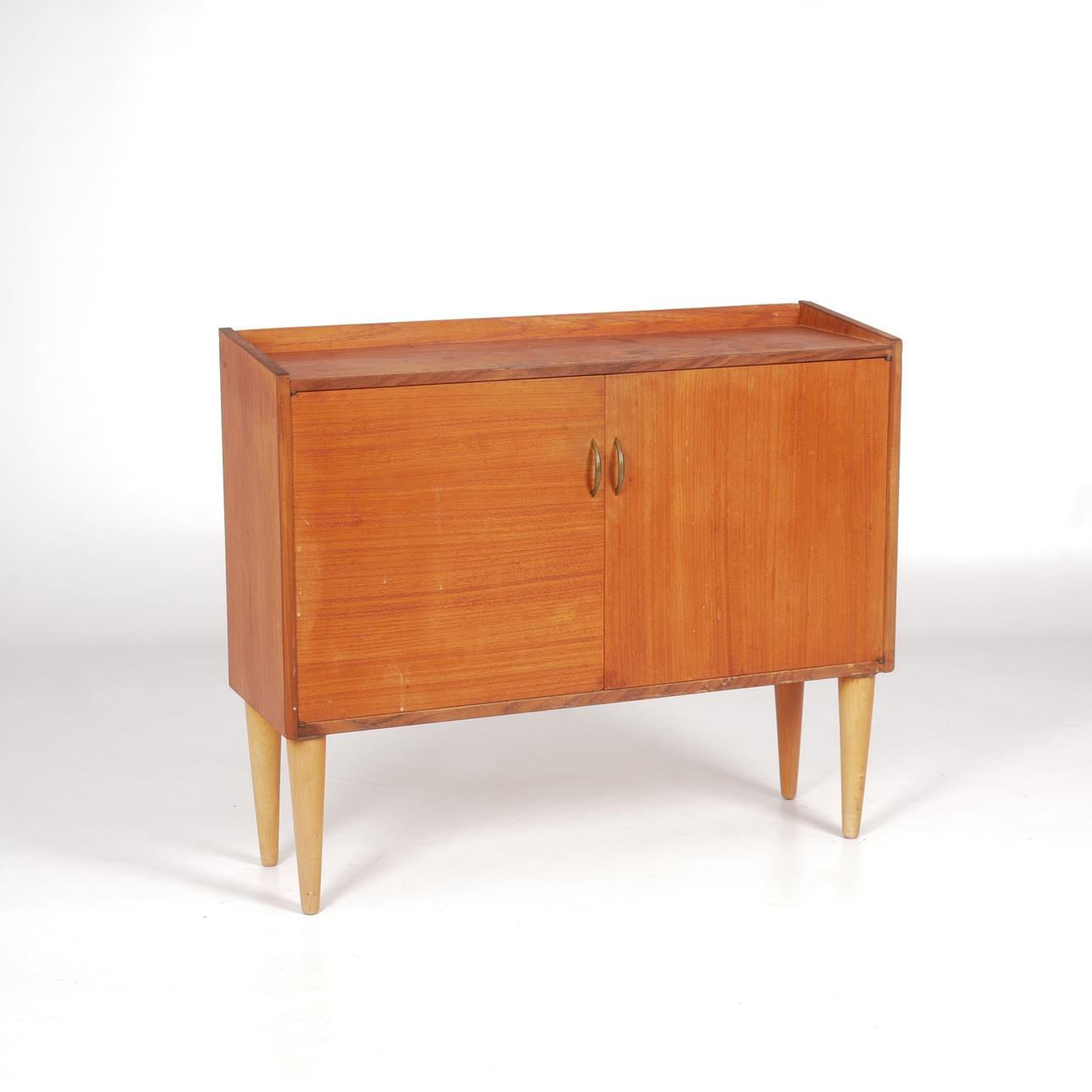 A teak sideboard, with sarg, 1950s/60s.