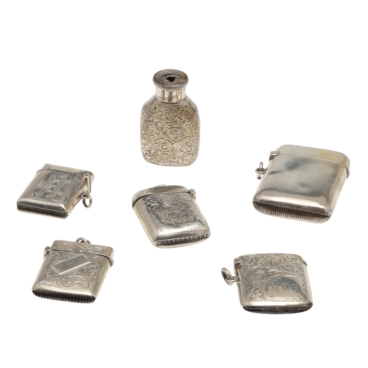 FÜNF SILBERNE VESTA-KOFFER.