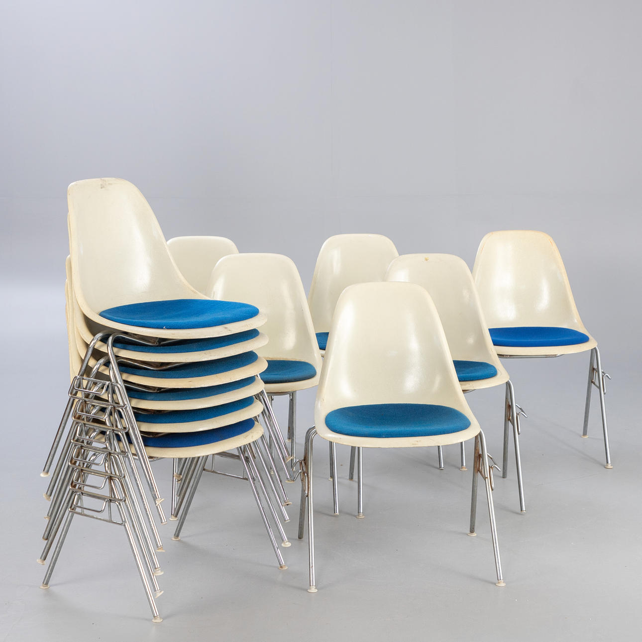 CHARLES & RAY EAMES. Herman Miller/Vitra, 12 DSS stackable chairs.